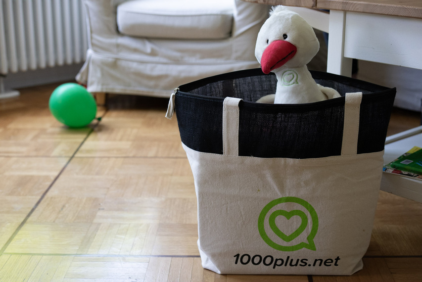 ein Storch in einer 1000plus-Tasche